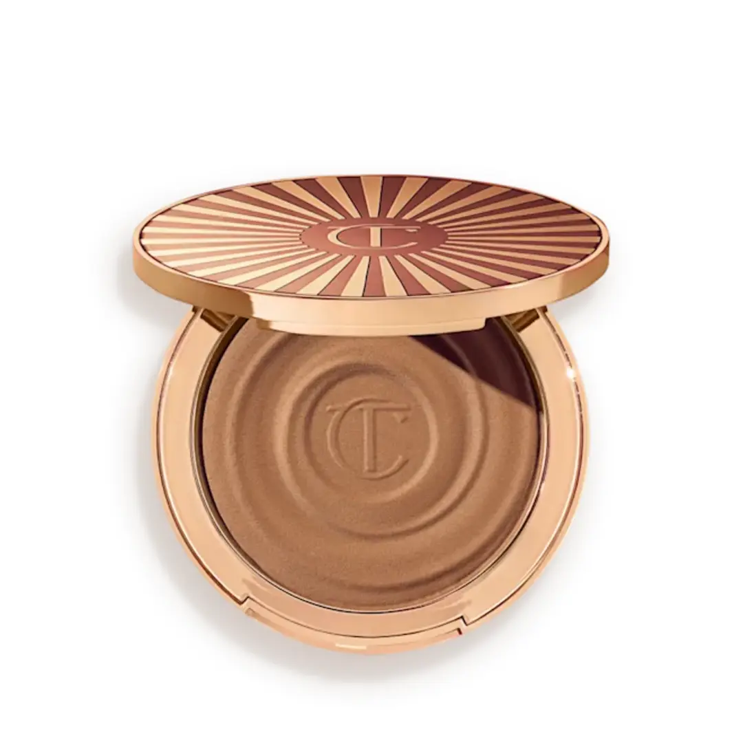 Charlotte Tilbury BEAUTIFUL SKIN SUN-KISSED GLOW BRONZER 1 Fair. Charlotte Tilbury BEAUTIFUL SKIN SUN-KISSED GLOW BRONZER 1 Fair.